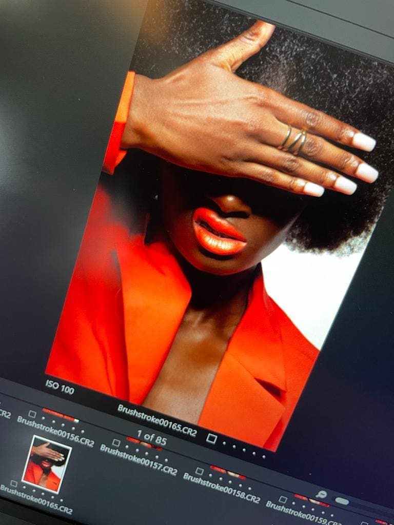 Girl in red dress with nails