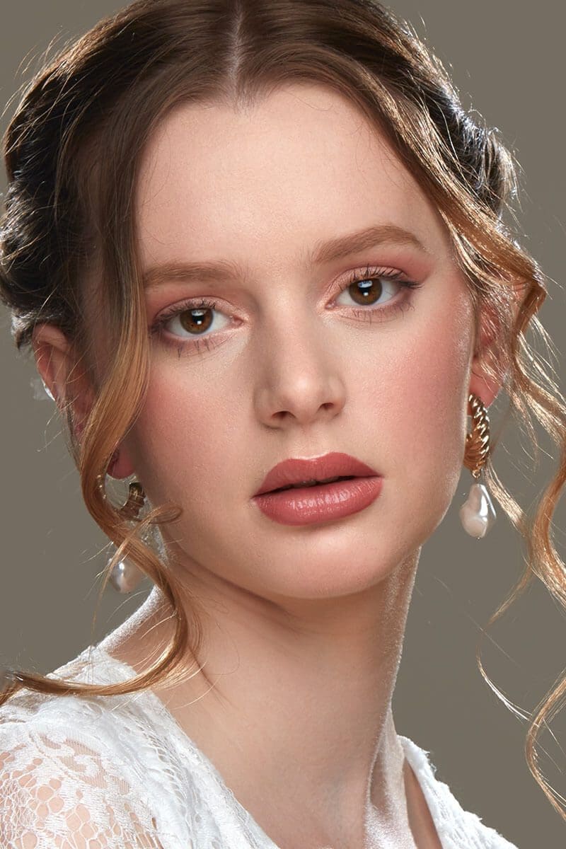 A bold conceptual fashion makeup look on set
