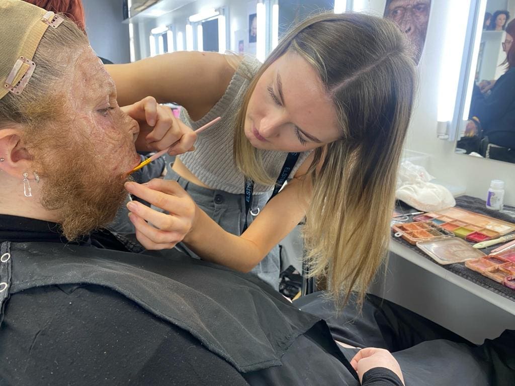 student working on SFX makeup